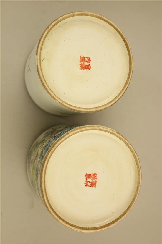 Two Chinese famille rose cylindrical jars and covers, 13cm and 13.5cm